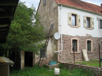 Haus und Außenanlage renoviern und Anbau von 2 Zimmern