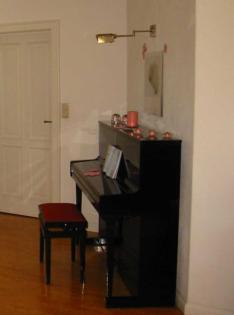 Schimmel-Klavier 112-10 T Tradition schwarz Hochglanz