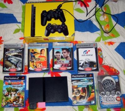 Playstation 2 Slim mit 6 Org. Spiele im Org. Karton top zustand !!!