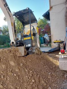 Minibagger-Arbeiten rund um Haus