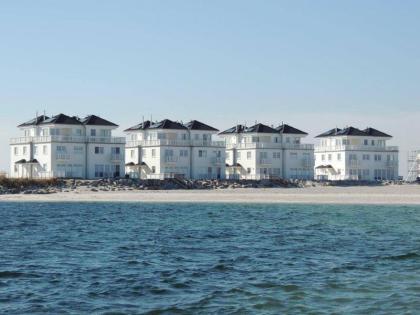 Ferienhaus in spektakulärer Lage direkt am Strand: Weiße Strandvillen/ Kappeln