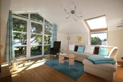 Rügen: Ferienwohnung direkt am Sandstrand der Ostsee, Meerblick, Sauna, 