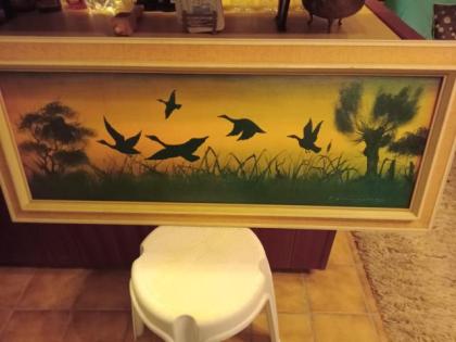 Wandbild, Schwäne in der Wiese